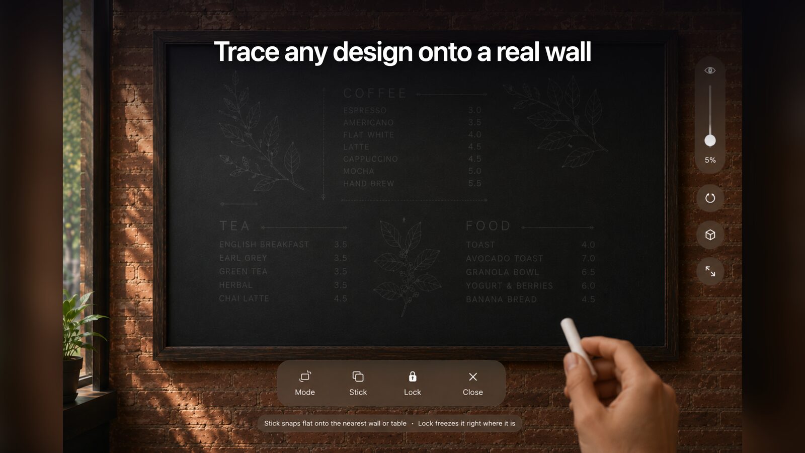 A design ghosted on a real cafe chalkboard, being traced by hand in LumaTrace